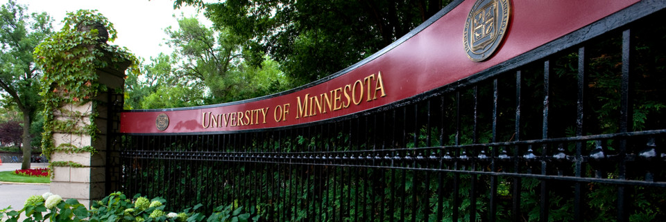 Image of a maroon gateway with University of Minnesota written in yellow.
